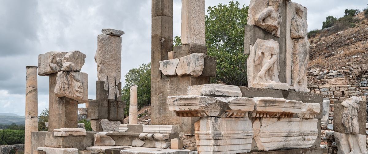 Carved figures and the inscribed architrave of the Memmius Monument on Domitian Square, Ephesus