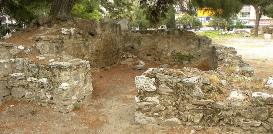 Excavated stone foundations of ancient Thyatira lying under the pines in central Akhisar